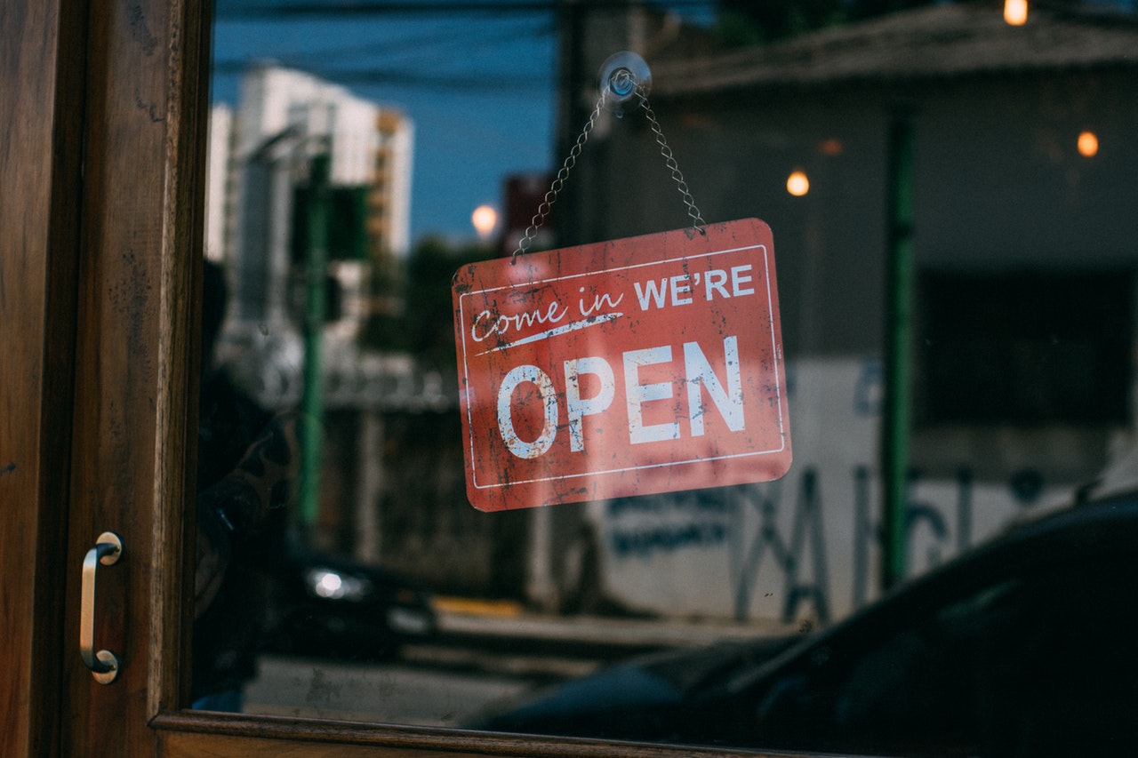 small business with an open sign on door